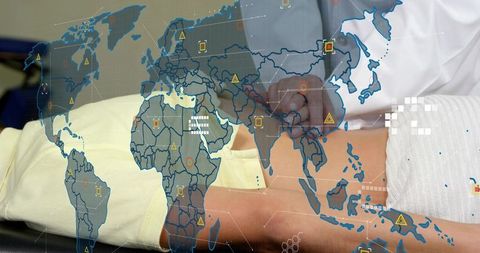 Doctor examining abdomen on clinic table with global telemedicine data overlay