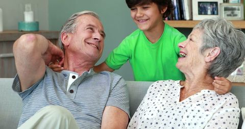 Grandparents Enjoying Moment with Grandson at Home - Download Free Stock Images Pikwizard.com