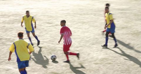 Boys Playing Soccer on Outdoor Field in Sunny Day - Download Free Stock Images Pikwizard.com