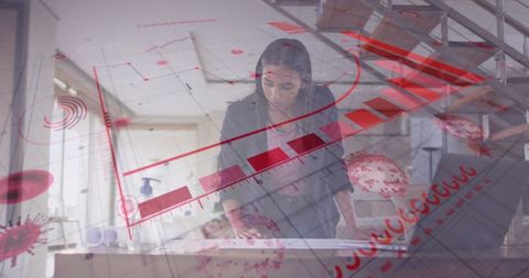 Businesswoman Analyzing Data on Digital Interface in Modern Office