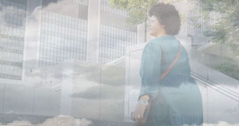Confident Businesswoman Walking Amidst Skyscrapers with Cloud Overlay