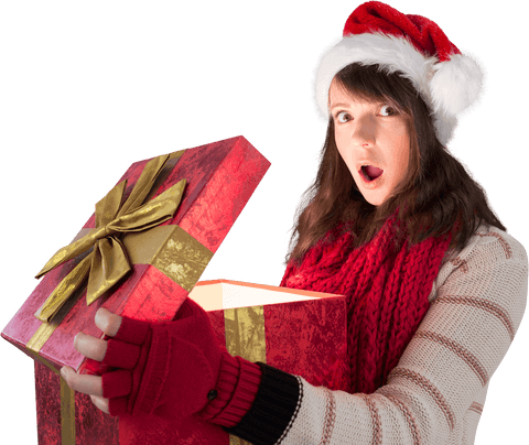 Surprised woman opening big red christmas gift, transparent background