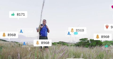 Mature Hiker Exploring Nature with Digital Communication Icons
