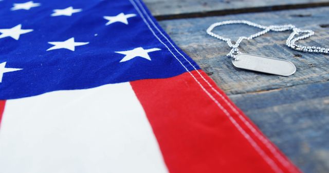 Close-up of American Flag and Dog Tags on Wooden Surface - Download Free Stock Images Pikwizard.com