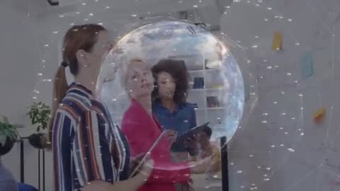 Women In Business Collaborating with Global Digital Technology in Office