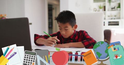 Asian Schoolboy Attending Virtual Class Surrounded by Educational Icons