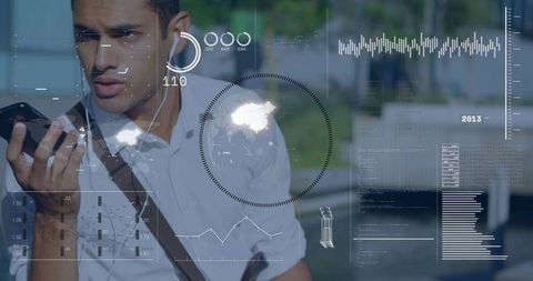 Young man speaking into smartphone while walking with earphones and augmented hud overlays