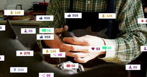 Skilled woodcarver at work with social media activity overlay