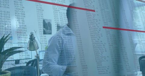 Data analyst behind glass with translucent data overlay and office reflections showing digital workf