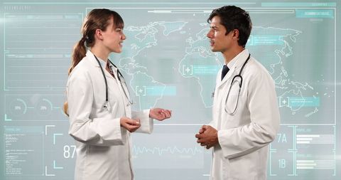 Doctors Discussing Medical Innovation with Digital Interface - Download Free Stock Images Pikwizard.com