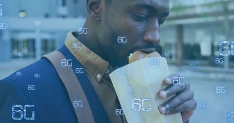 Business commuter eating sandwich in urban plaza with 6g holographic connectivity overlay
