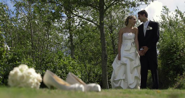 Bride and Groom in Outdoor Wedding Ceremony with Bridal Shoes and Bouquet - Download Free Stock Images Pikwizard.com