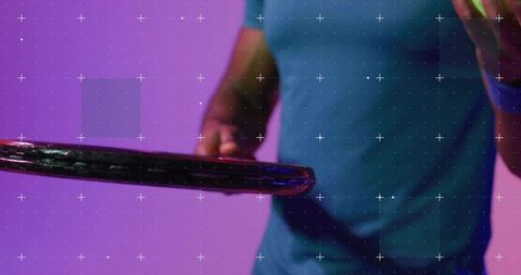 Man Holding Racket Rim Gesturing Toward Green Ball with Neon Magenta and Teal Lighting