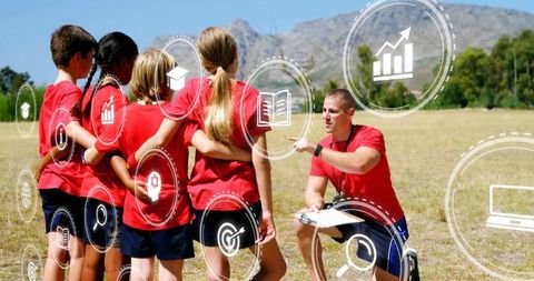 Coach guiding youth team outdoor motivation