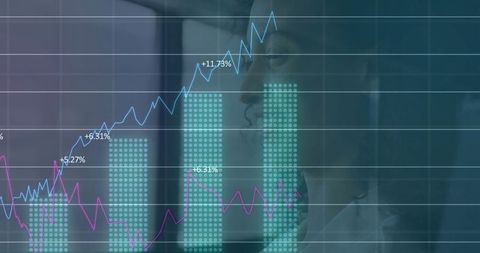 Woman Analyzing Financial Charts at Office Window