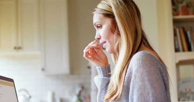 Young Woman Concentrating on Computer Work at Home - Download Free Stock Images Pikwizard.com