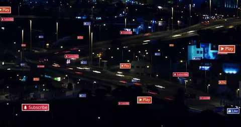 Urban night freeway with digital play subscribe like overlays and neon light trails
