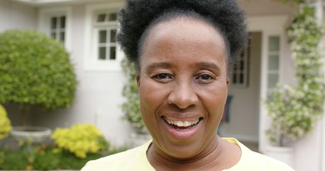 Joyful Middle Aged Black Woman Smiling Outdoors in Front Yard - Download Free Stock Images Pikwizard.com