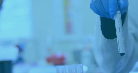 Scientists Conducting Experiments in High-Tech Laboratory Setting