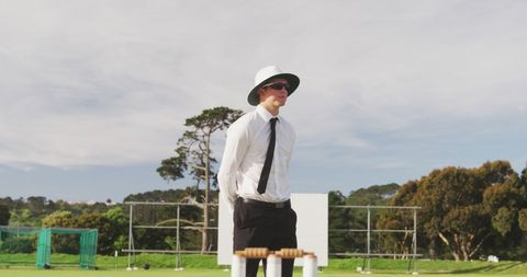 Cricket Umpire Standing Alertly during Match on Sunny Day - Download Free Stock Images Pikwizard.com