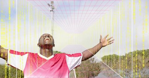 Man raising arms celebrating victory on field with binary overlay and futuristic wireframe