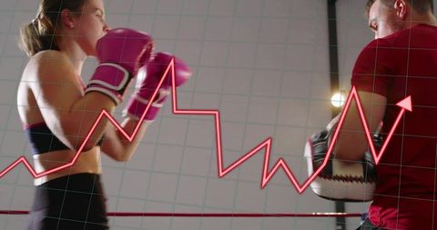 Female boxer sparring with coach using focus mitts in ring with performance chart overlay