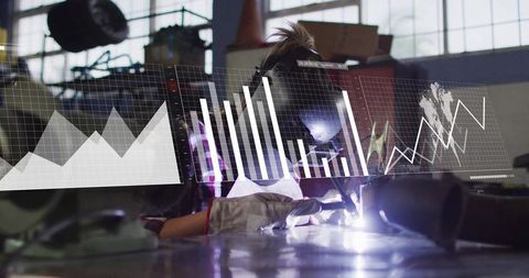 Female Welder Performing TIG Welding with Augmented Data Overlays in Industrial Workshop