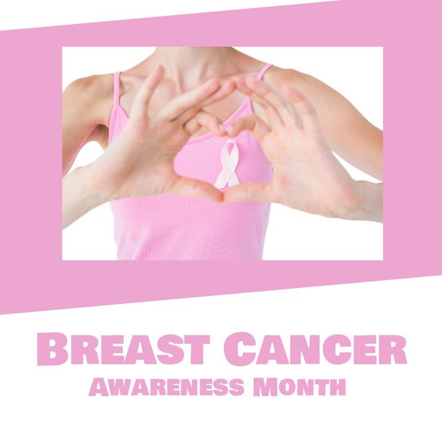 Image depicts a woman wearing a pink top, forming a heart shape with her hands to support Breast Cancer Awareness Month. Ideal for promoting breast cancer awareness, educational materials, healthcare campaigns, and social media posts encouraging support and solidarity during October.