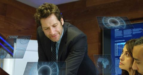 Manager Presenting Data with Futuristic Holographic Interfaces