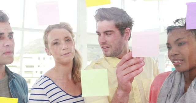 Team Brainstorming with Sticky Notes in Office - Download Free Stock Images Pikwizard.com