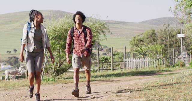 Two Friends Enjoying a Morning Hike on Rural Trail - Download Free Stock Images Pikwizard.com