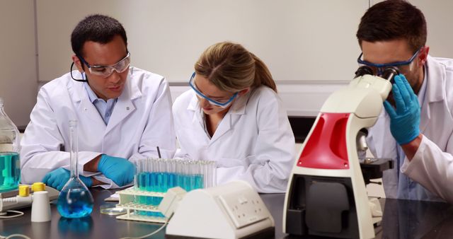 Team of Scientists Conducting Research in Modern Laboratory - Download Free Stock Images Pikwizard.com