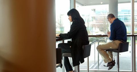 Business Professionals Working in Modern Cafeteria - Download Free Stock Images Pikwizard.com