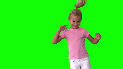 Energetic Little Girl Jumping in Slow Motion