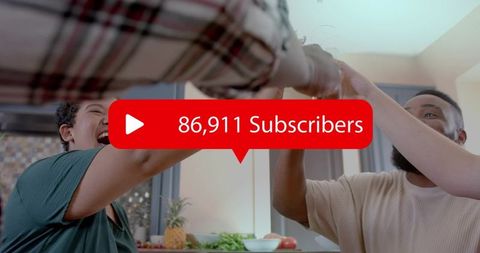 Friends celebrating 86,911 subscribers in kitchen high five social media milestone