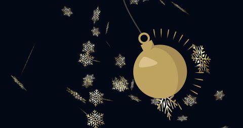 Golden christmas bauble with falling snowflakes on black background