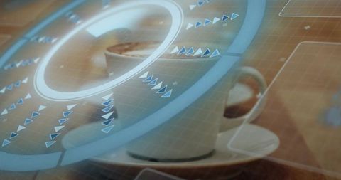 White coffee cup on wooden table with blue HUD overlay suggesting smart cafe tech and data