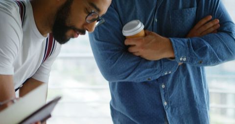 Focused Business Team Collaborating on Project