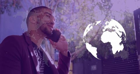 Young professional talking on phone with digital globe and dotted world map overlay