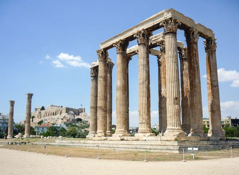 Ancient Temple Columns with Distant Parthenon View