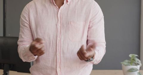 Business Professional in Pink Shirt Delivering a Presentation