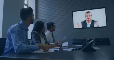 Corporate Meeting Room with Virtual Conference on Screen