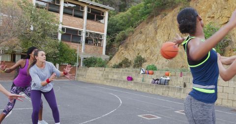 Diverse Female Basketball Team Playing on Outdoor Court - Download Free Stock Images Pikwizard.com