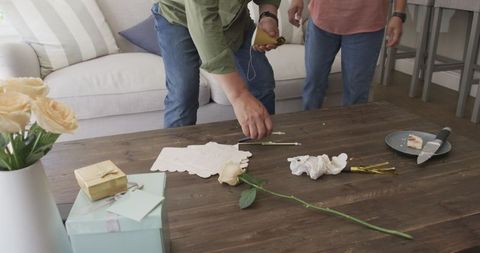 Preparing for celebration at home with gifts and cake