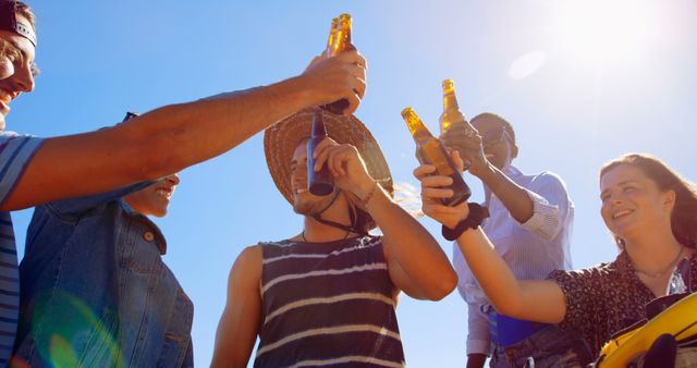 Diverse Friends Enjoying Beach Day with Beer - Download Free Stock Images Pikwizard.com