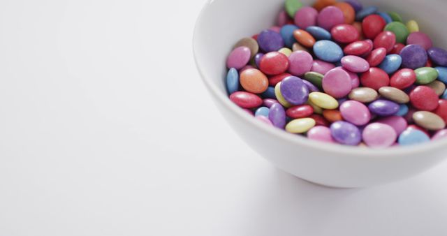 Colorful Chocolate Candies in White Bowl - Download Free Stock Images Pikwizard.com