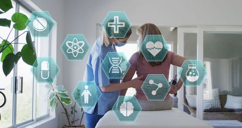 Nurse Assists Senior Woman with Healthcare Technology Integration