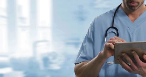 Healthcare Professional Using Digital Tablet in Medical Setting - Download Free Stock Images Pikwizard.com