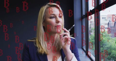 Senior Manager Contemplating Business Strategies Near Window