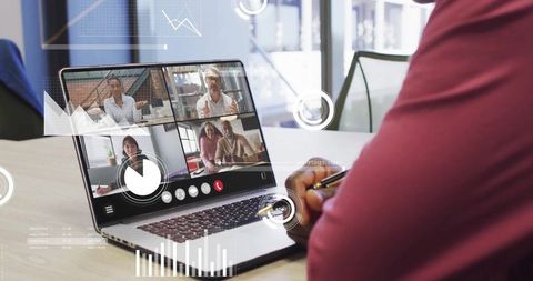 Businessman Engaged in Video Call with Data Visualization Overlays